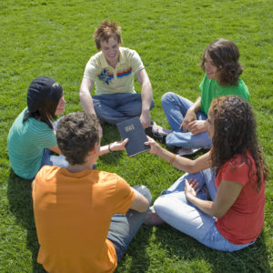 Five teens hang out in a park and share a bible
